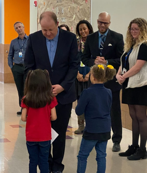 Gov. Polis visits with students